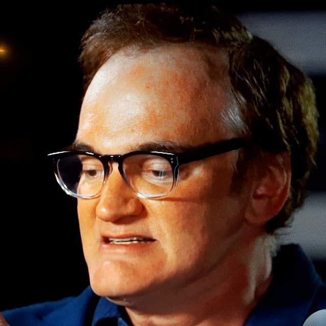 Quentin Tarantino has small lips and a recessed mouth