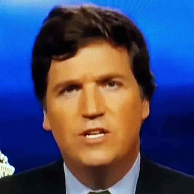 Fox News host Tucker Carlson has underbite and a look that screams please punch me in the face