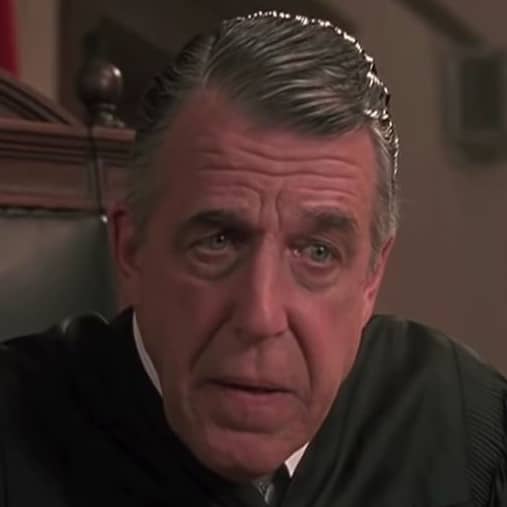 Massive-jawed actor Fred Gwynne as Judge Chamberlain Haller